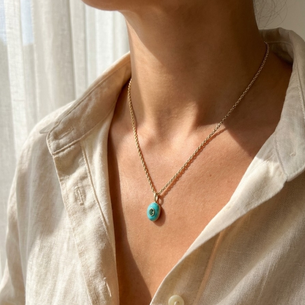 Blue natural stone pendant with embedded zirconia; .78"h x .4"w; nwot
